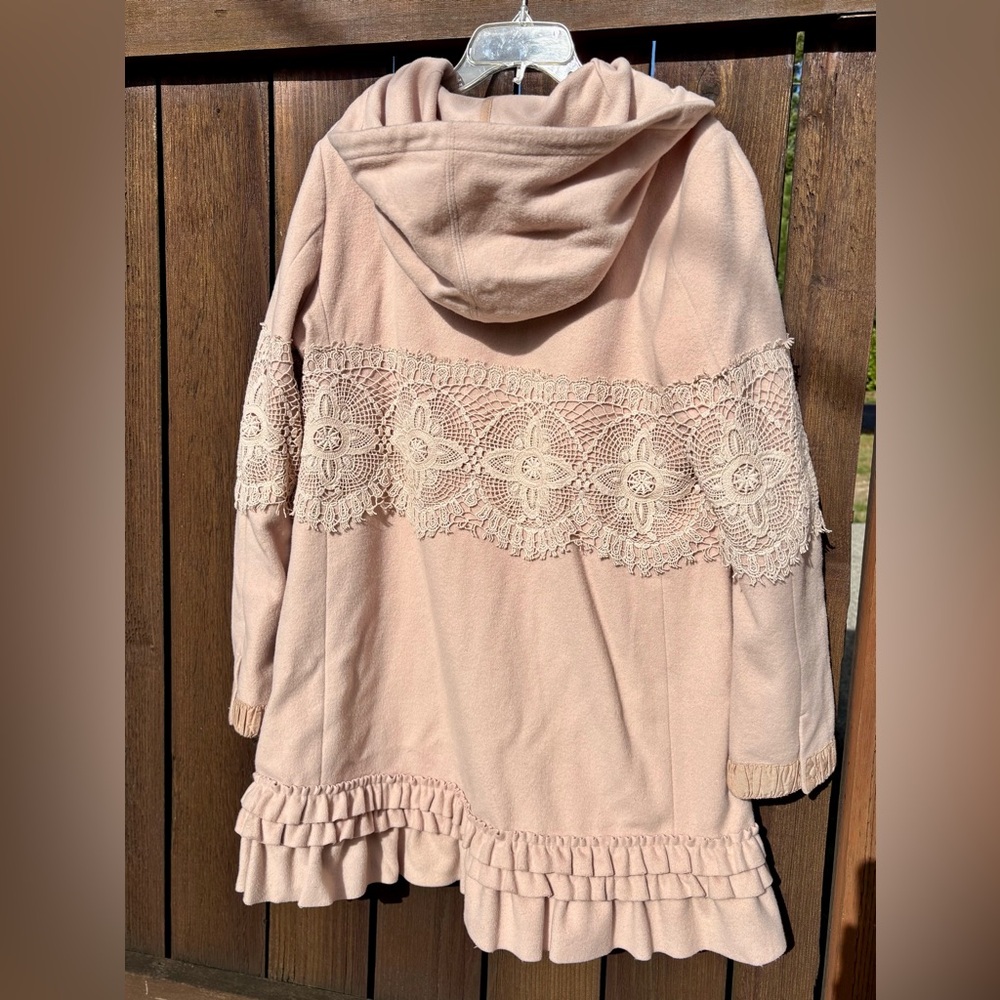 Odd Molly Light Pink Wool Coat with Brown and Pink Patterned Lining Fabric.
